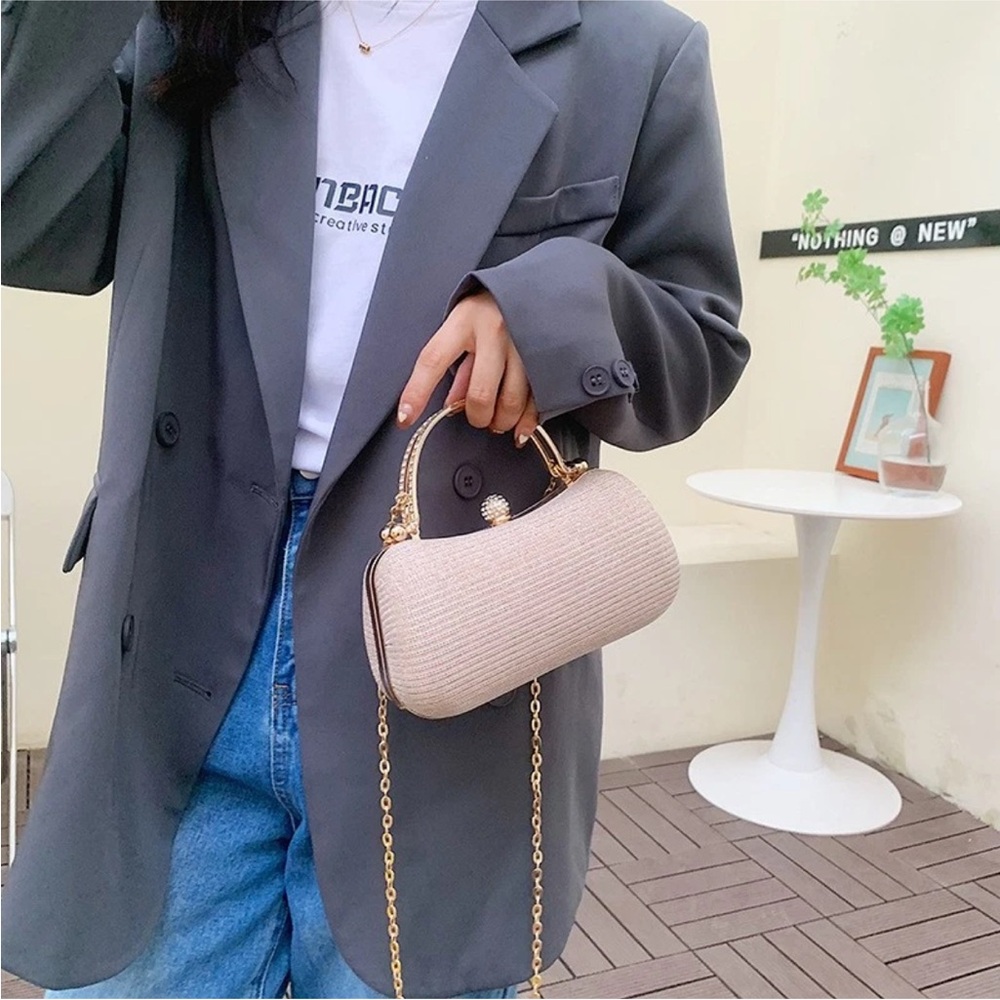Elegant Cream Handbag with Gold Chain